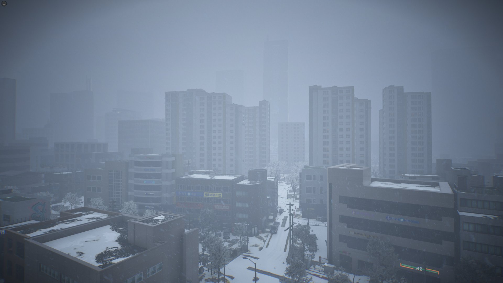 Dowon blanketed in snow during winter with fog rolling between apartment buildings