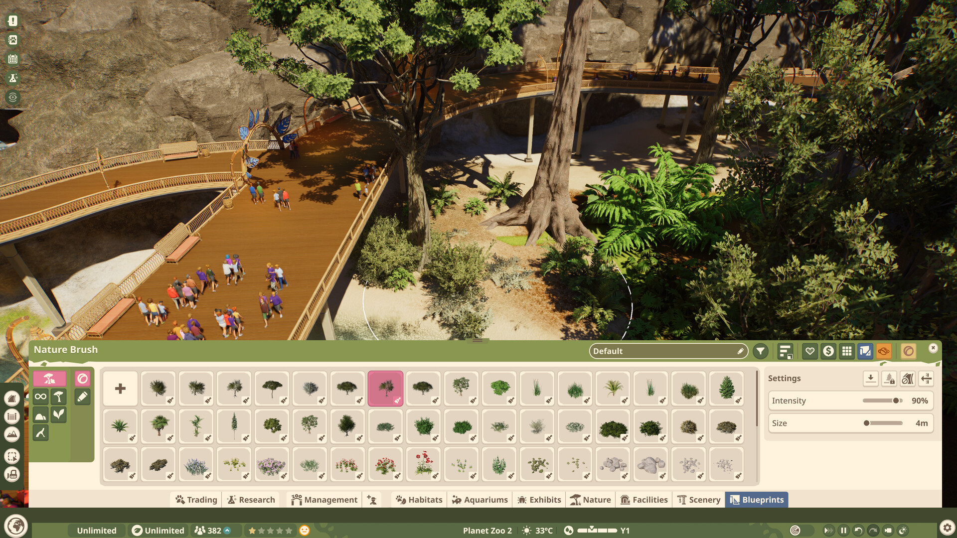 The nature brush palette of trees, shrubs and rocks open beneath an elevated guest walkway, with intensity and size settings