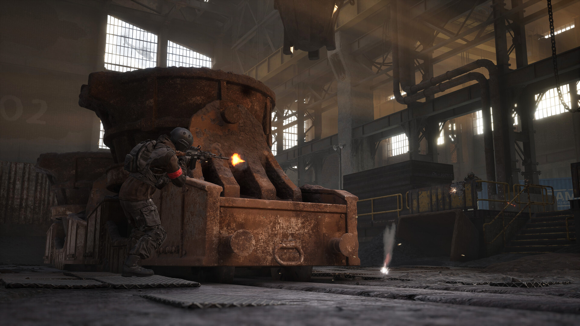 A WARDOGS soldier in a red faction armband fires from behind a rusted slag ladle inside a derelict steel mill