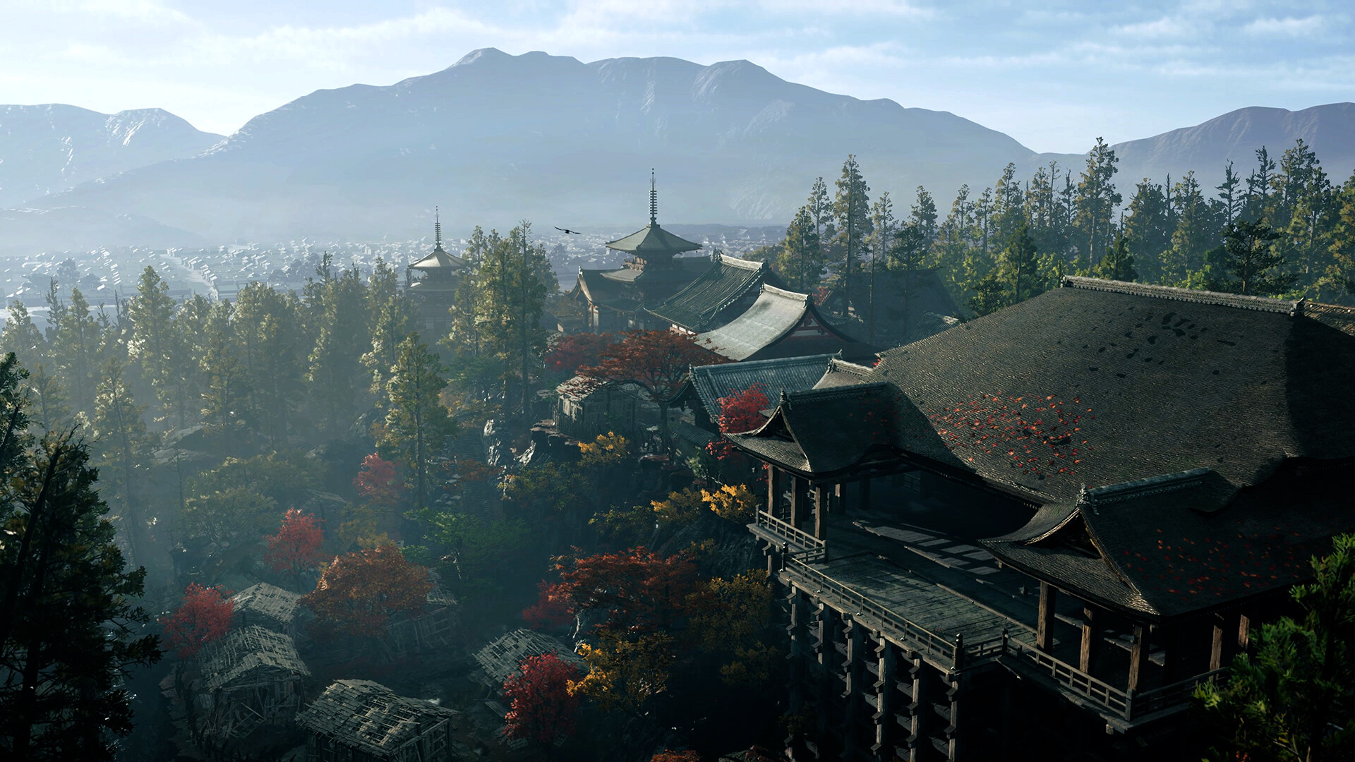 A hillside temple complex with a pillared wooden stage and pagoda looking out over Kyoto and the mountains beyond