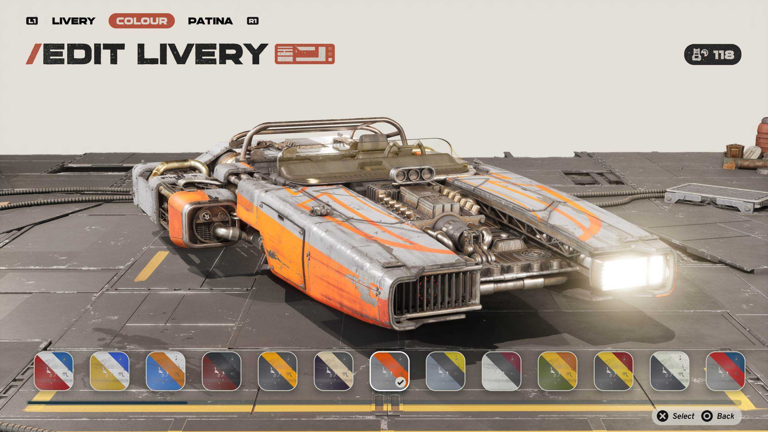 The livery editor with the Colour tab selected beside an orange and grey landspeeder