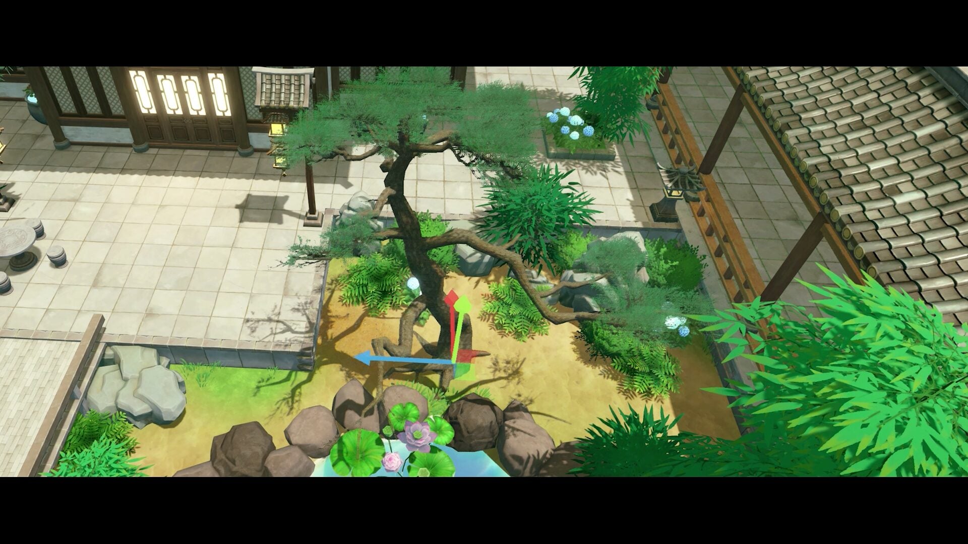 Garden courtyard with bonsai tree and decorative landscaping