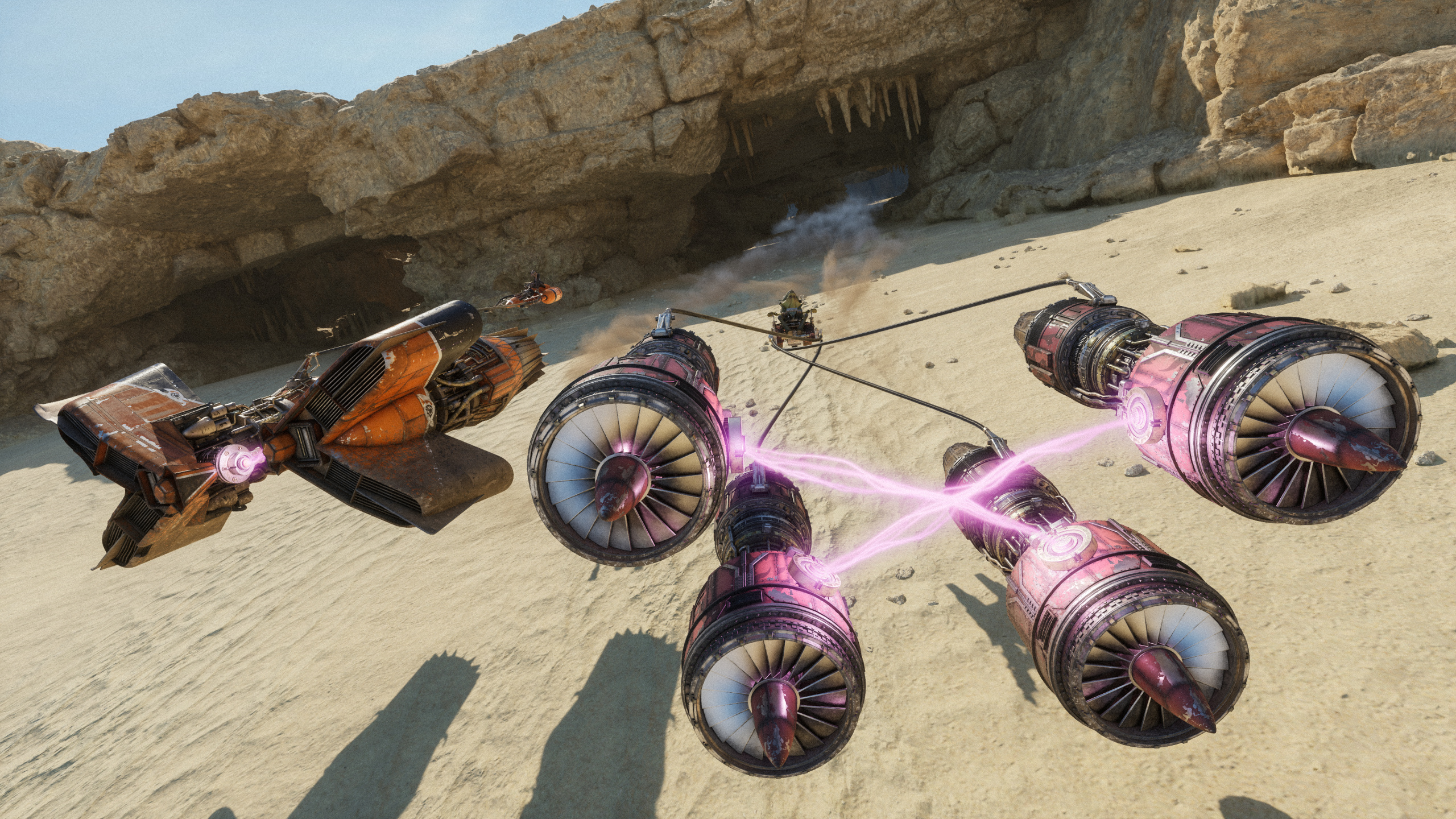 Two paired-engine podracers race across a sandy course below a rock overhang