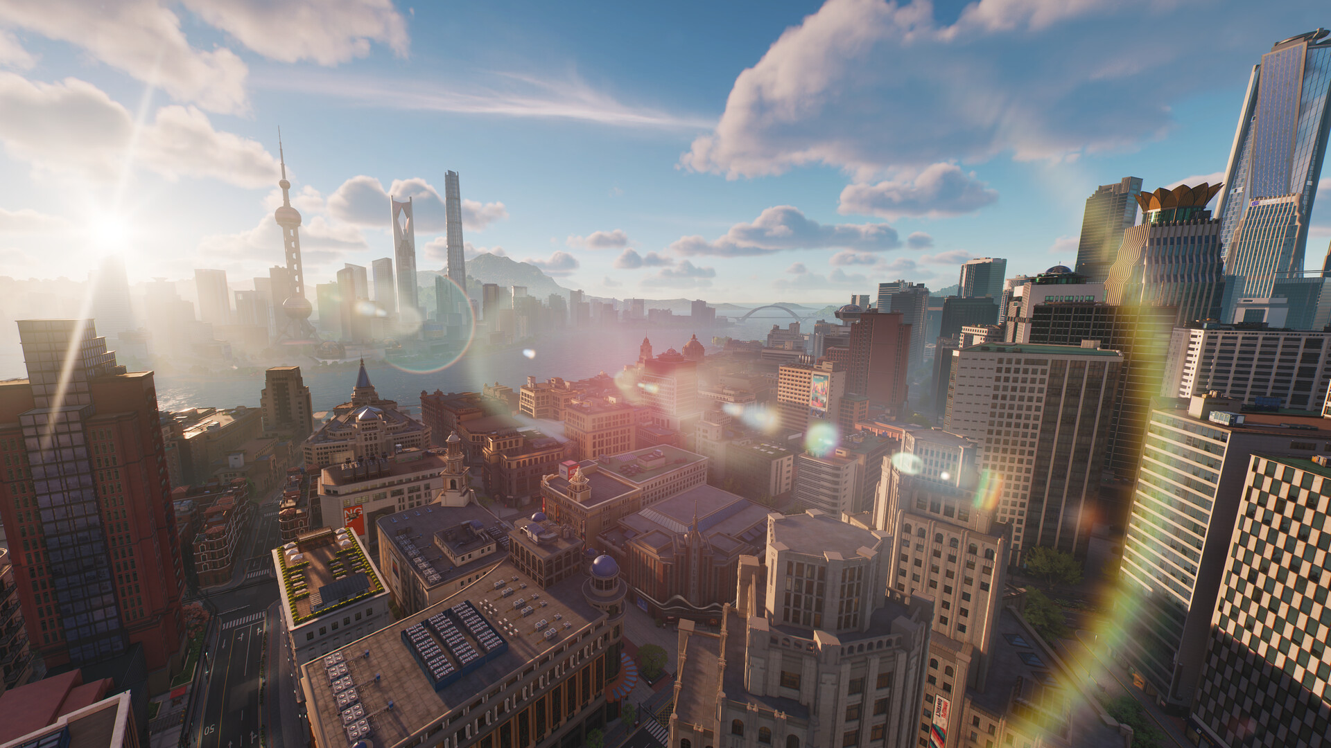 Chongxiao's riverside skyline at sunrise, with glass towers rising behind low colonial-era waterfront blocks