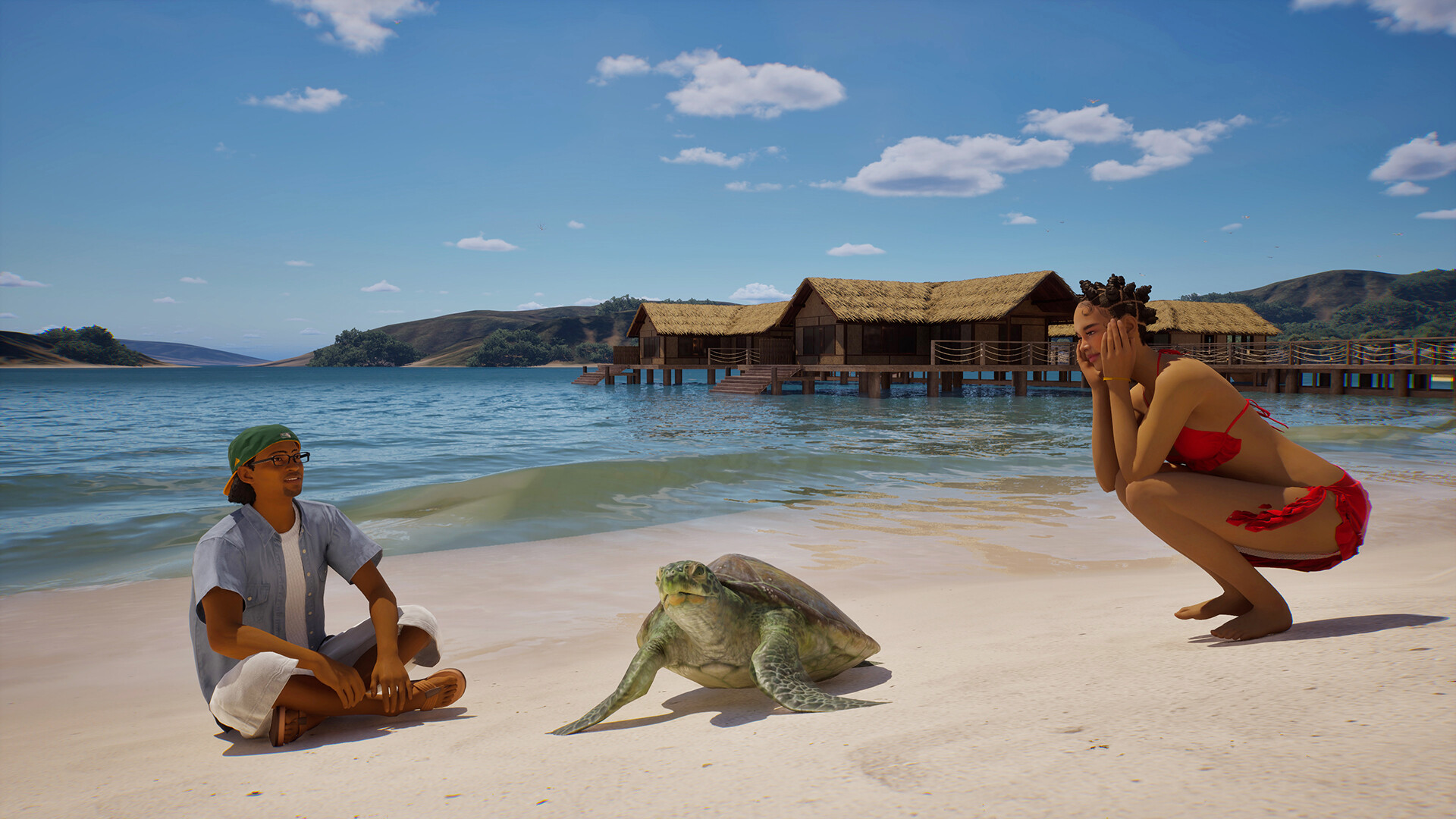 Two Zois watching a sea turtle on a white sand beach with overwater bungalows behind