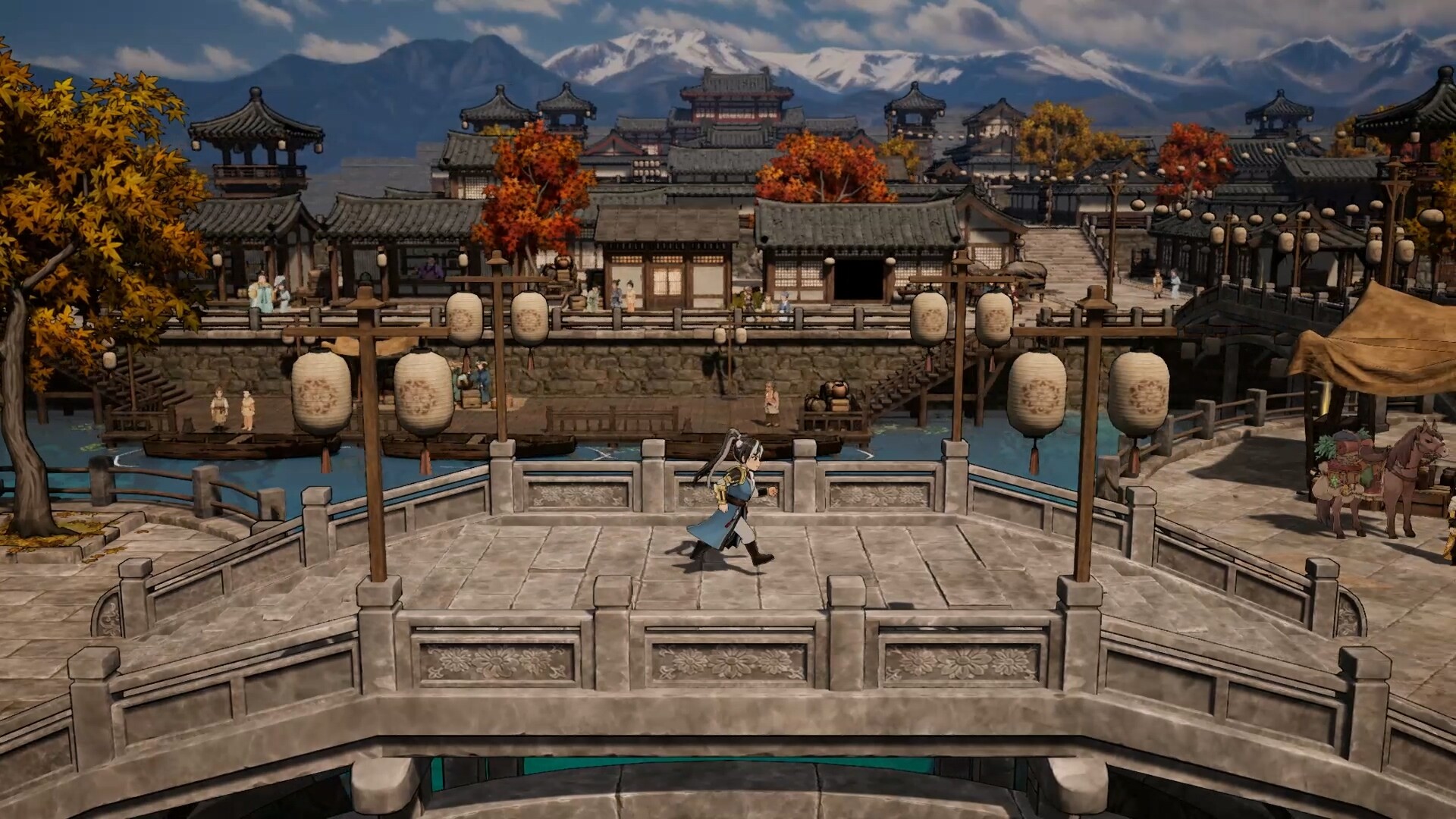 A stone arch bridge over a river leading into a walled town of tiled roofs and hanging lanterns, with snow capped mountains behind.