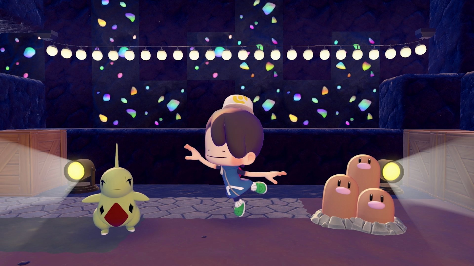 A player character dancing with Larvitar and three Diglett in an underground cave venue with spotlights and string lights