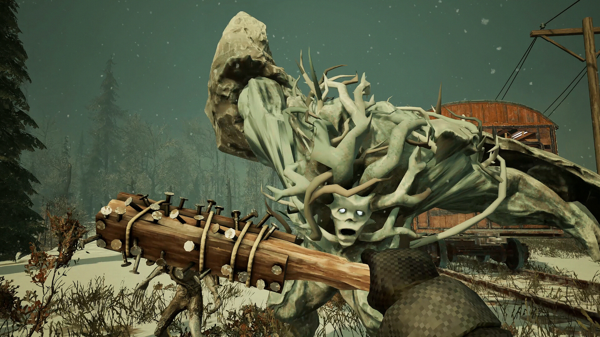 A player swinging a spiked club at a twisted creature beside the tracks in Frostrail