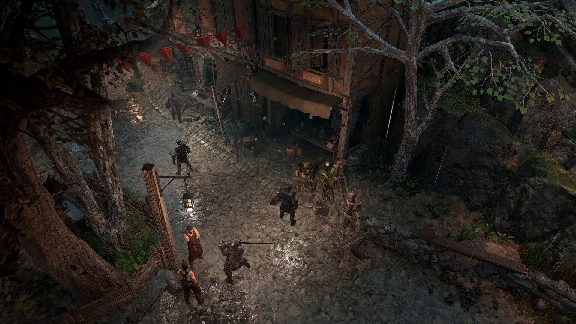 Knights and the fiefdom’s own townsfolk share a timber-framed settlement at night, a market stall open beside the cobbles