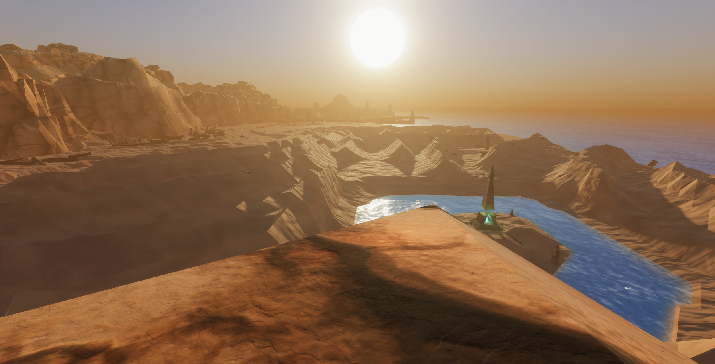 In development view of a desert canyon with a narrow watercourse running below a low sun