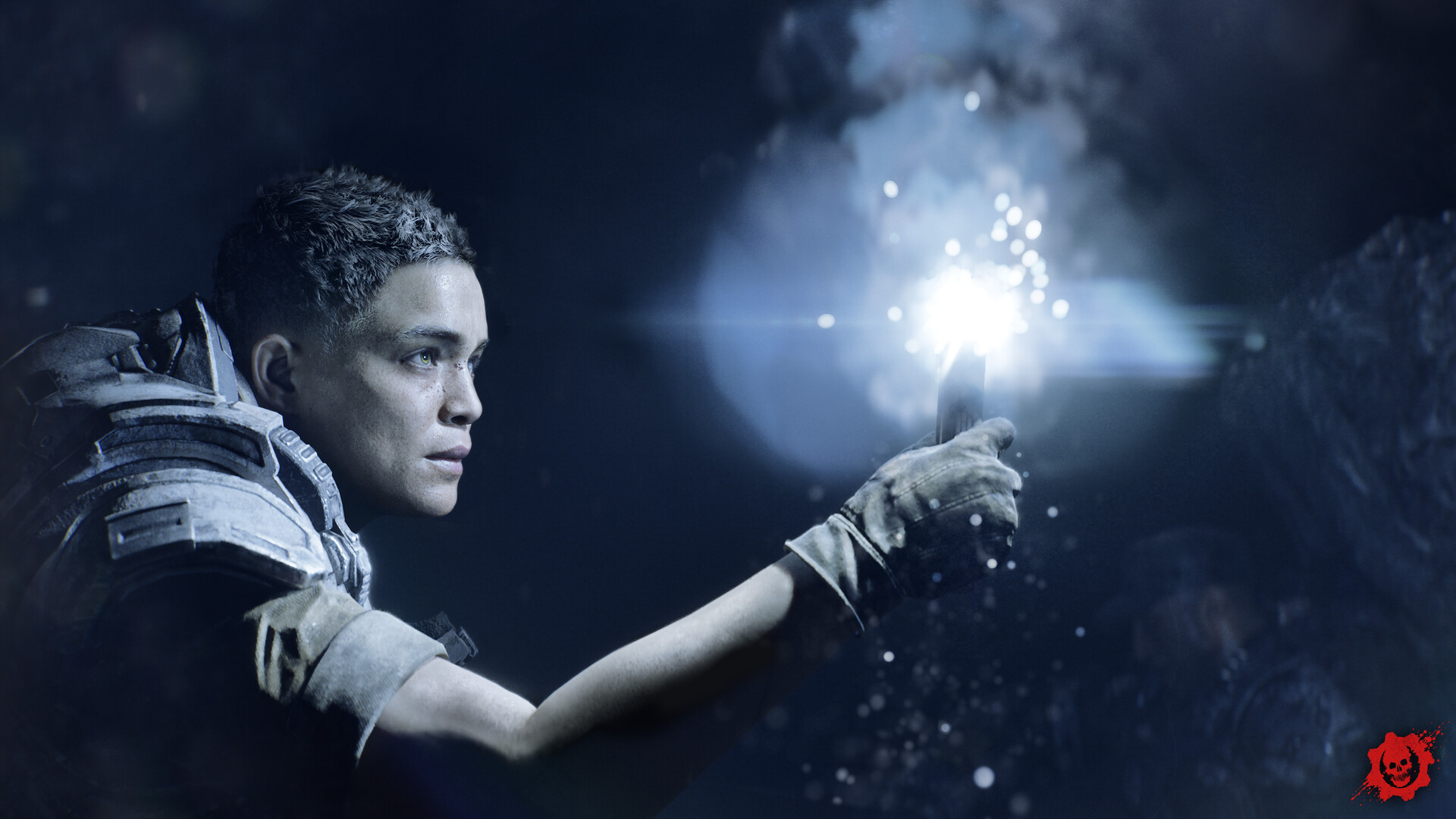 A Gear holds a burning flare aloft to light a pitch-dark space