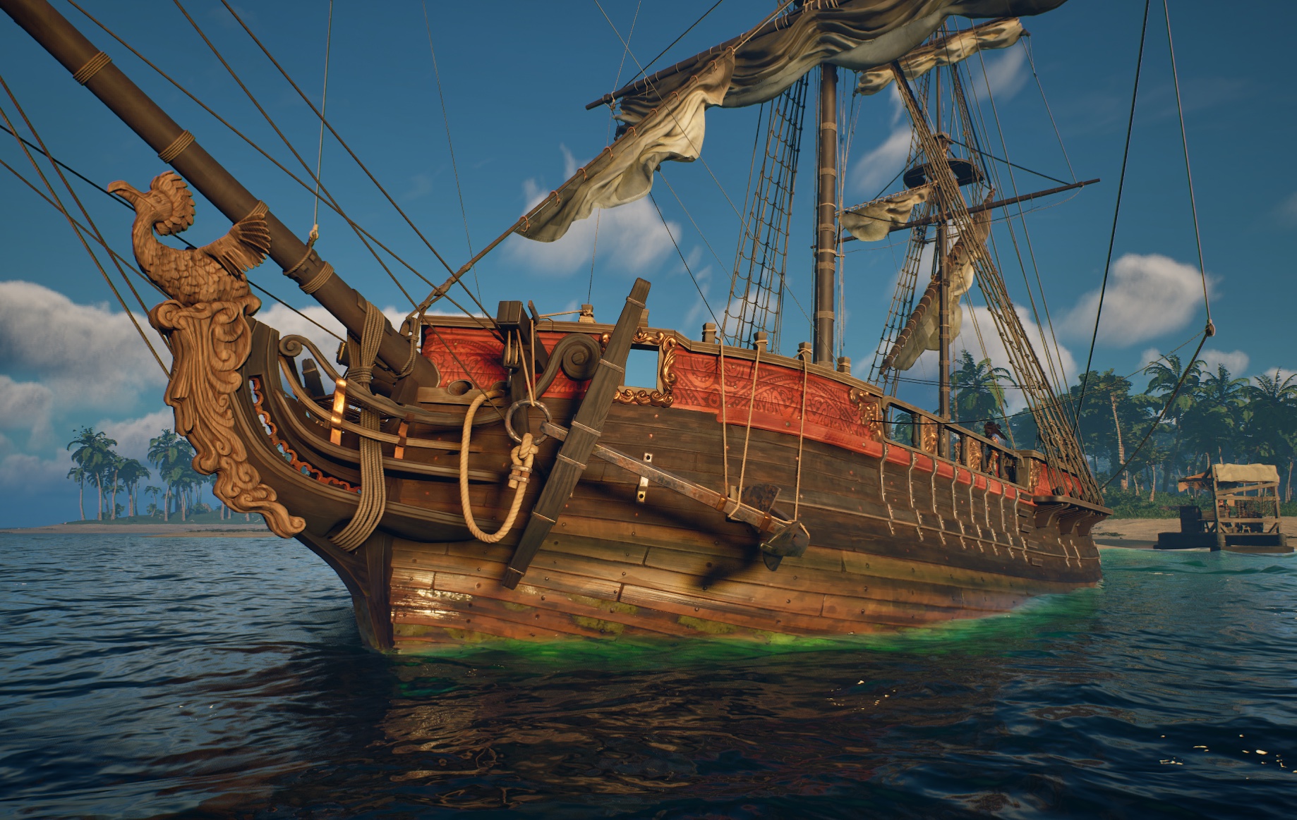 Work-in-progress preview of a ship with a red and gold hull color scheme and a carved bird figurehead, showing the exterior color options planned for the Ashlands update