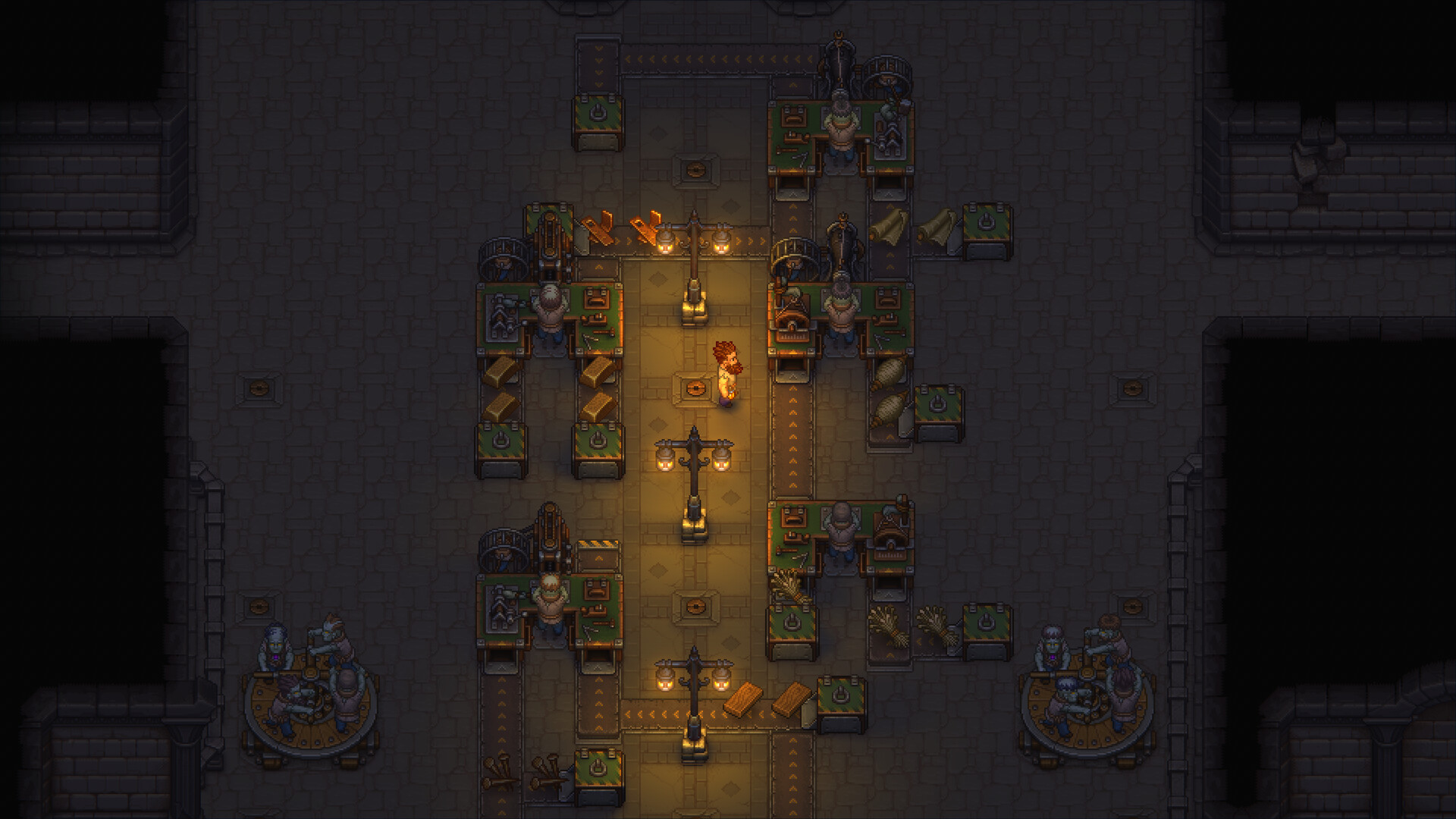 Graveyard Keeper 2 demo screenshot of the underground Town Workshop, with the Keeper in a lamp-lit central aisle between conveyor belts, zombie workers at benches on both sides and pairs of zombies turning capstan wheels in the corners