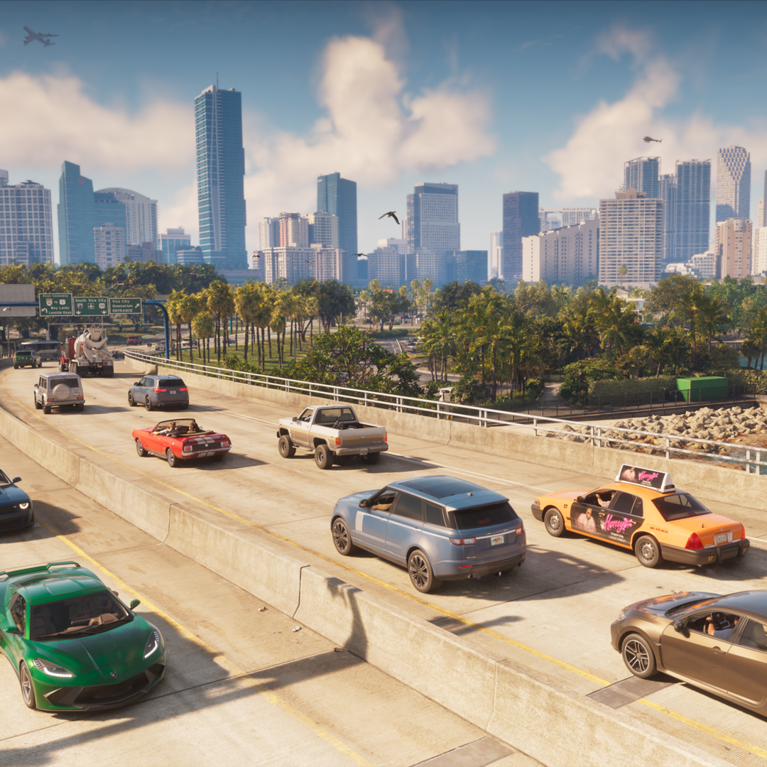 Traffic on an elevated highway in Vice City with the downtown skyline behind it and overhead signs for the Keys Causeway, South Vice City and the Vice City Oceanarium