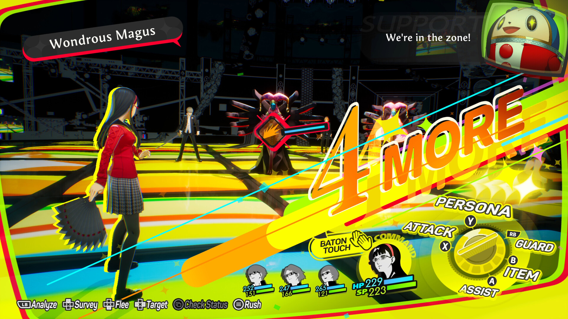 Battle interface showing a large 4 MORE extra-turn callout while Yukiko Amagi acts, with a Baton Touch prompt beside the radial command wheel offering attack, Persona, guard, item and assist, and Teddie giving support from a television frame
