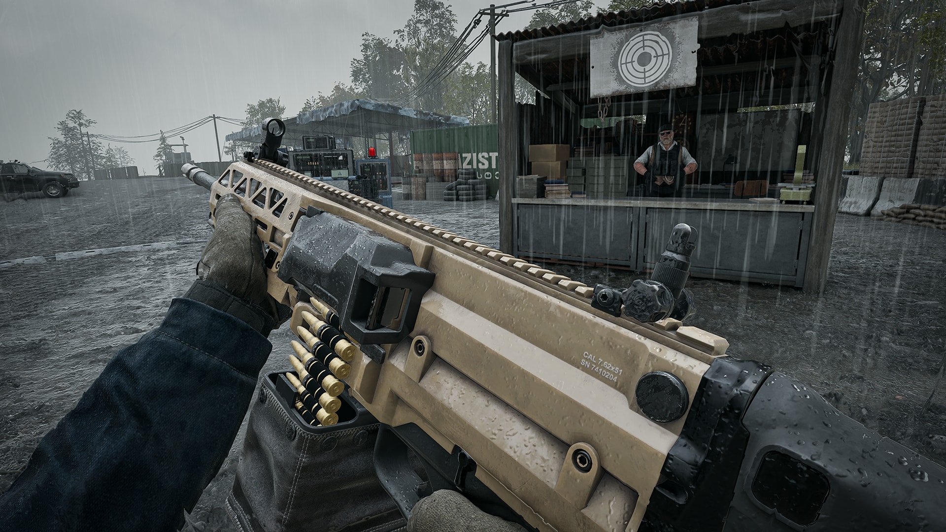 First-person view of the tan belt-fed Evo-3 Ultra light machine gun held in the rain beside a vendor stall at a firing range in WARDOGS