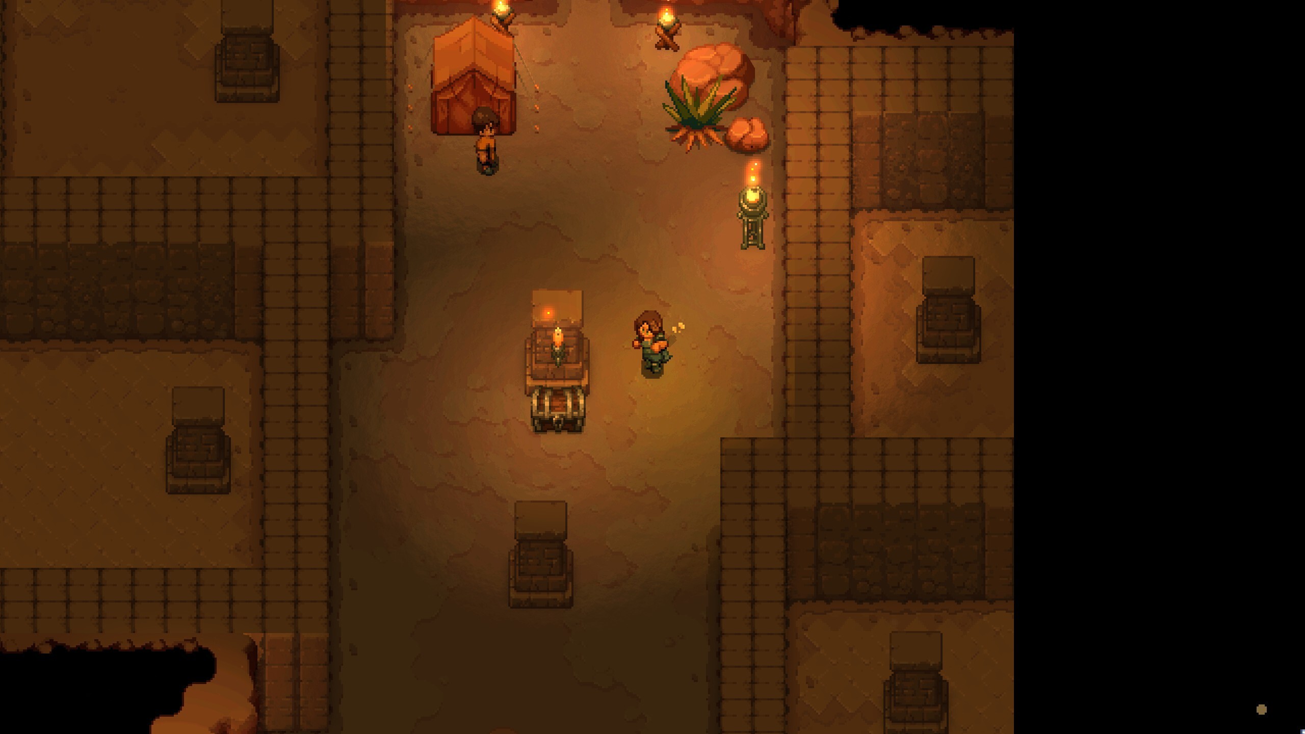 A desert crypt challenge dungeon room added in the Autumn Update, two players beside a lit brazier and a chest between sandstone brick walls, with torches, a red tent and a standing lantern near the entrance