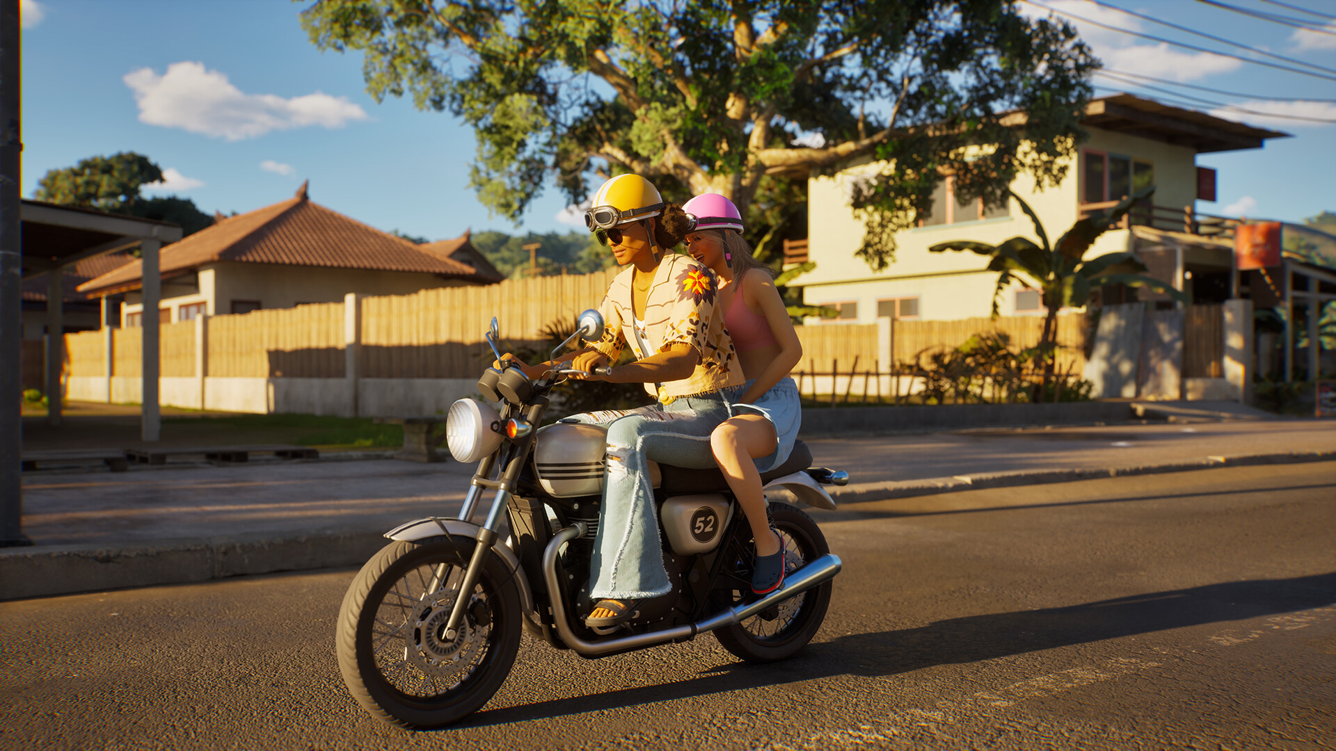 Two Zois riding a motorcycle through the streets of Cahaya
