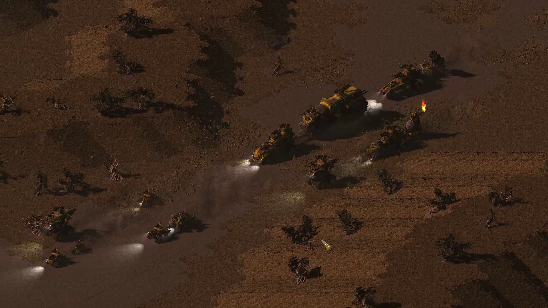 A column of motorized vehicles and infantry crossing a barren wasteland in D.O.R.F.