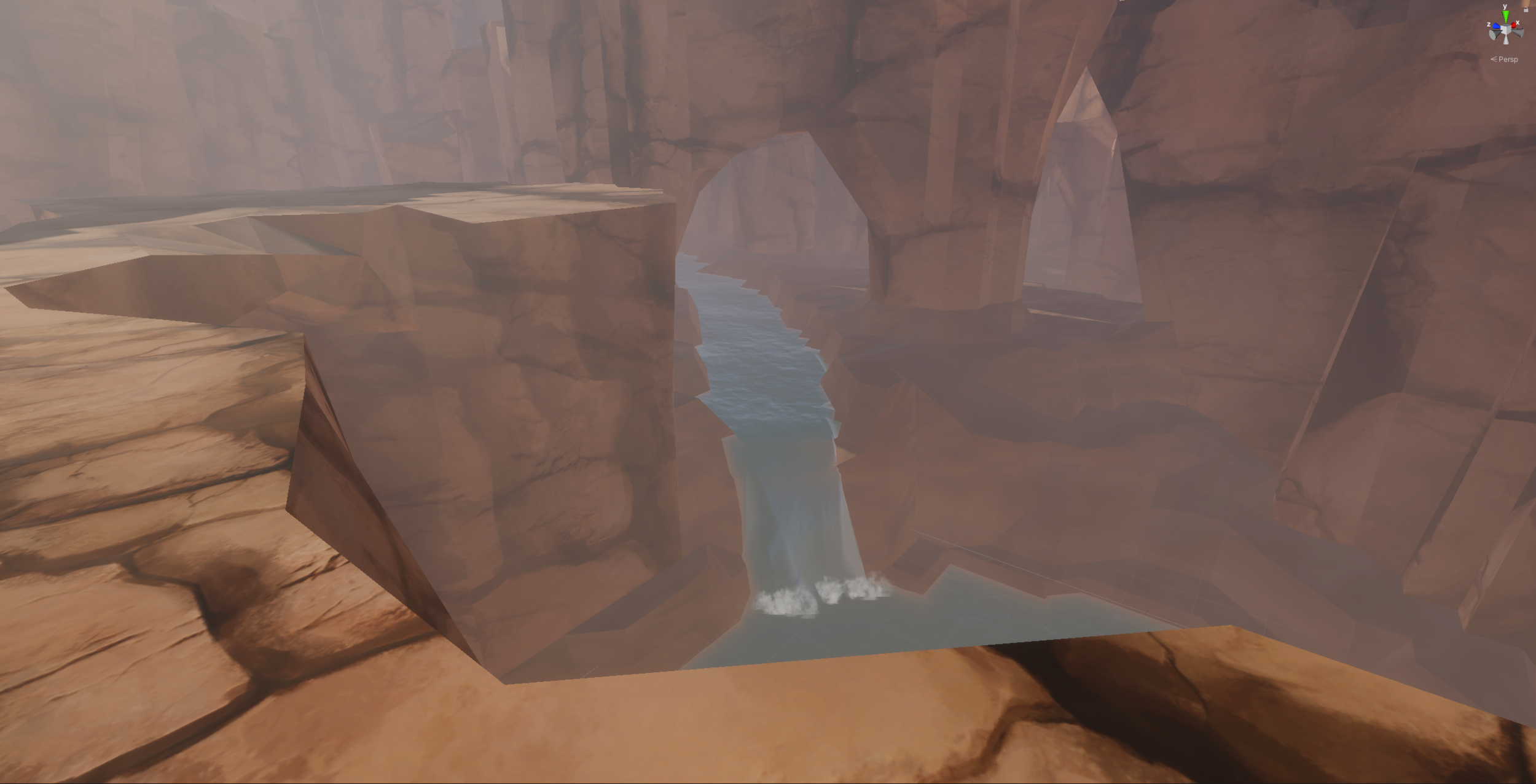 In development view of a rocky mountain pass with a waterfall dropping into a gorge
