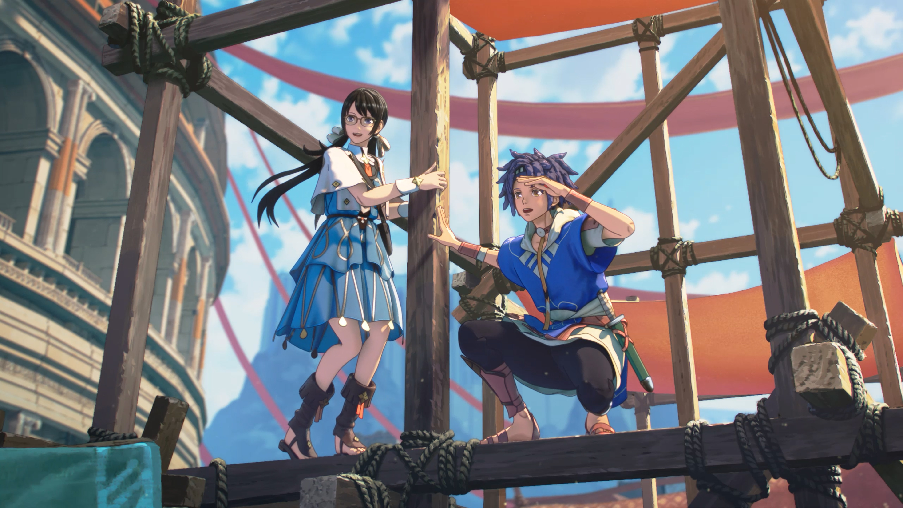 Cai and a bespectacled companion standing on scaffolding overlooking a city and its amphitheatre