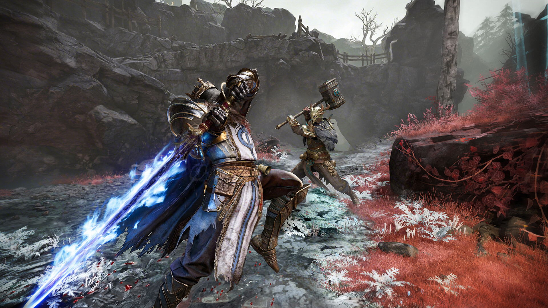 Two hunters clash on rocky ground overgrown with red and white growth, one swinging a greatsword wreathed in blue energy while the other charges in with a warhammer raised overhead