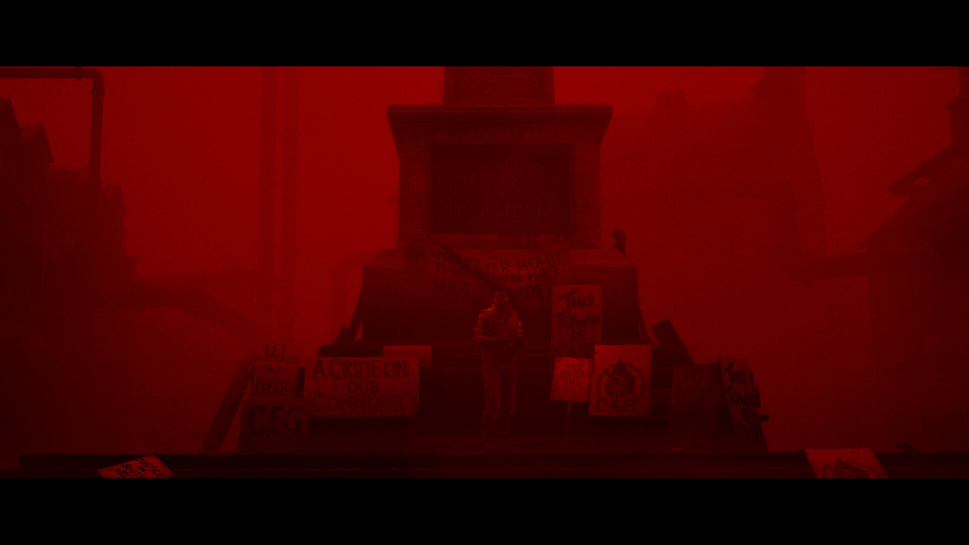 The town square memorial and protest placards under red Otherworld light