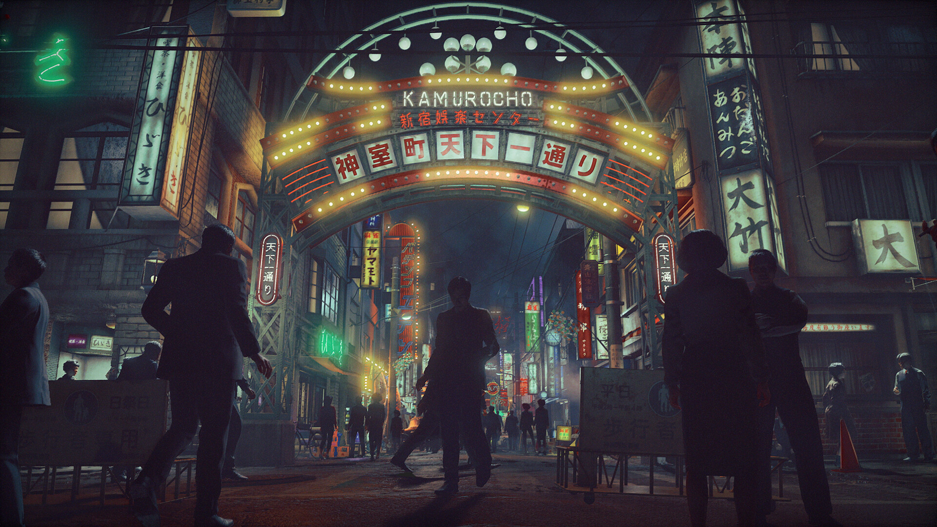 An illuminated arch reading Kamurocho above Tenkaichi Street, marking the entertainment quarter of the night-time Shinjuku district