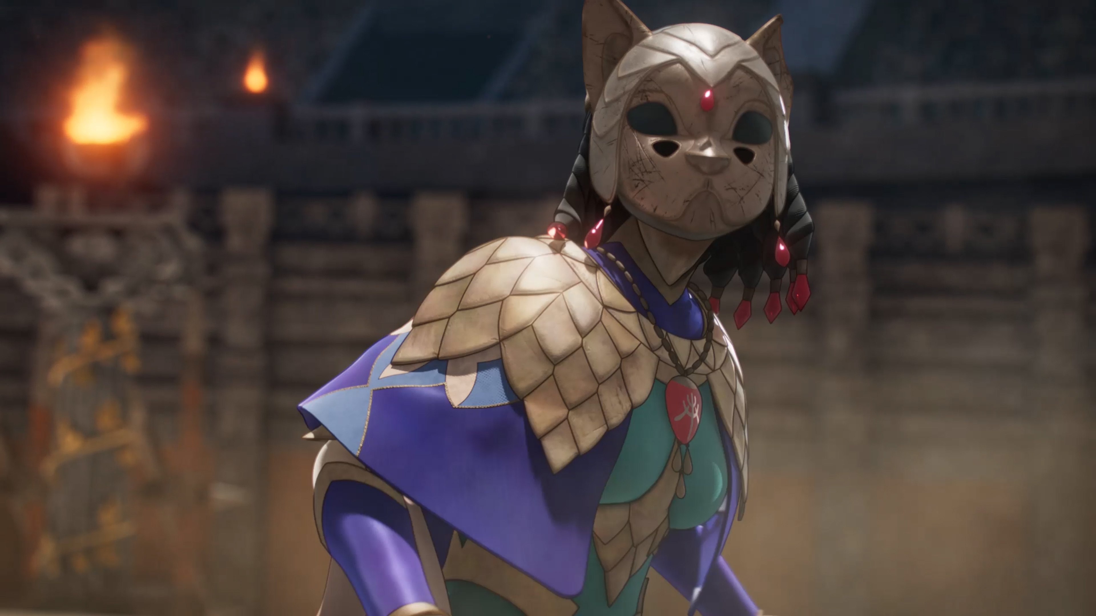Orchel standing in an arena wearing her gold cat mask, scale pauldrons and blue cape
