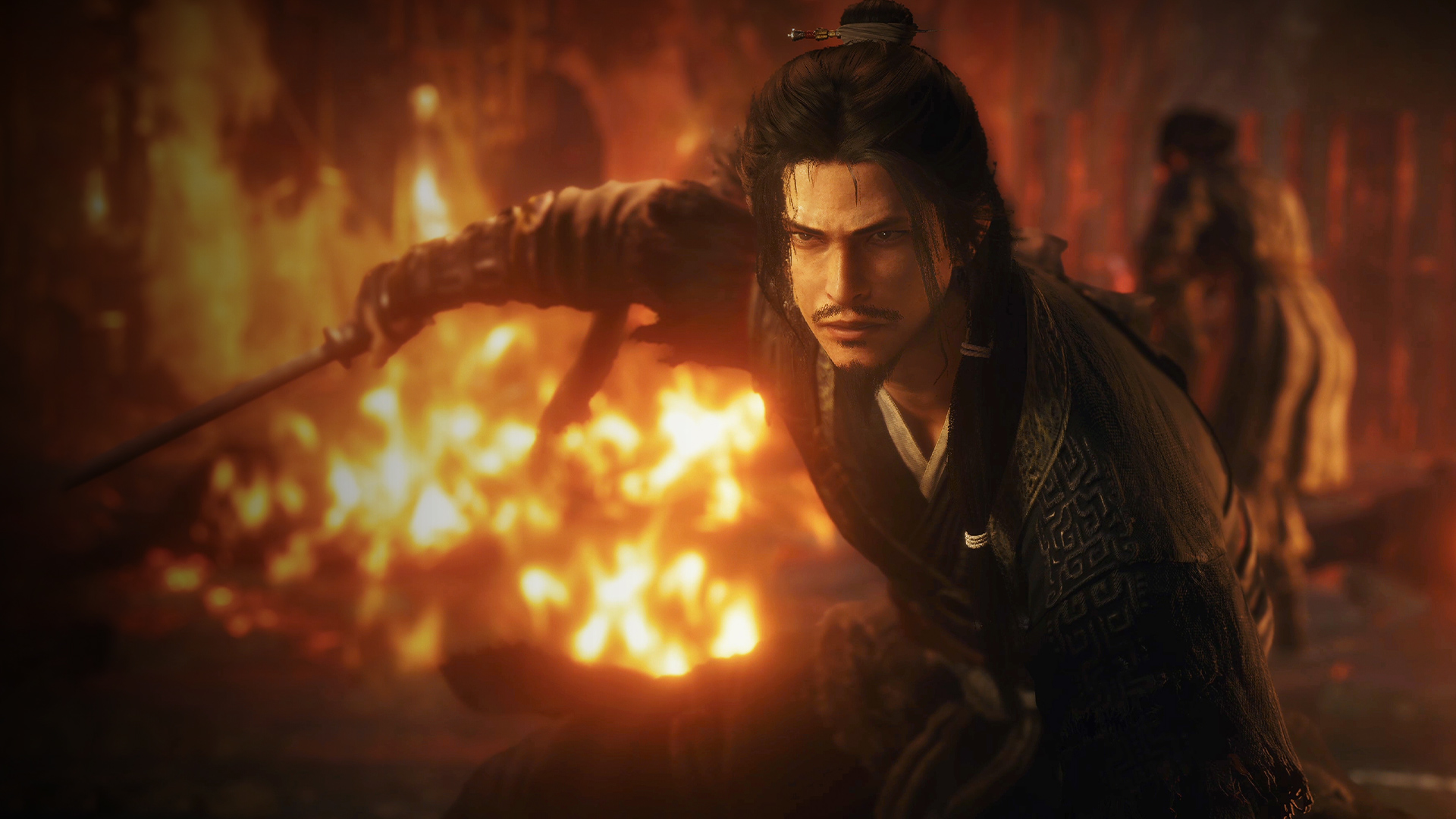 Tighter framing of the young swordsman in dark robes holding a straight sword before a fireball in Wo Long 2: Wings of Ember