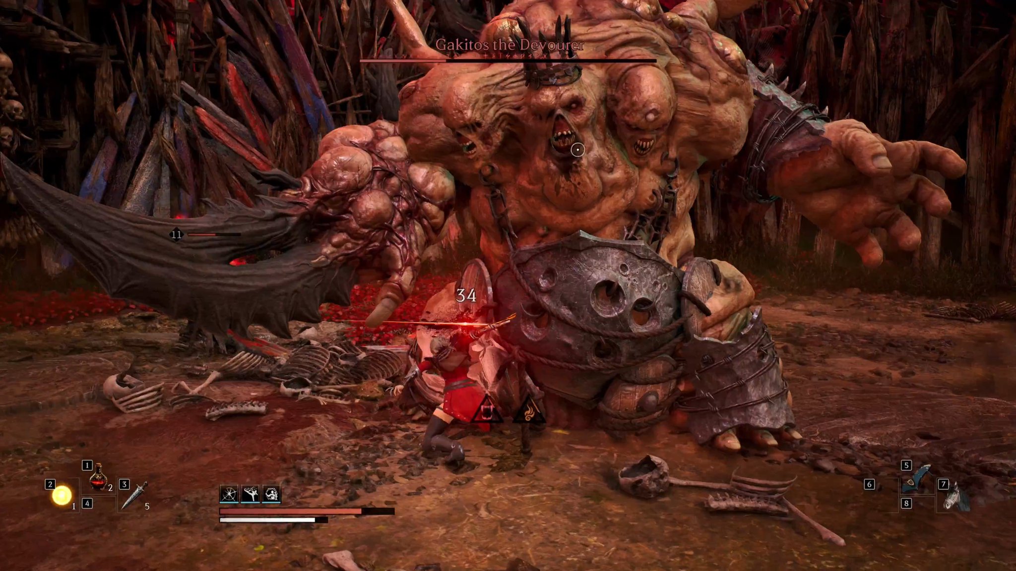 The Ranger and an ally battle Gakitos the Devourer, a towering boss shown in official August 2026 gameplay footage