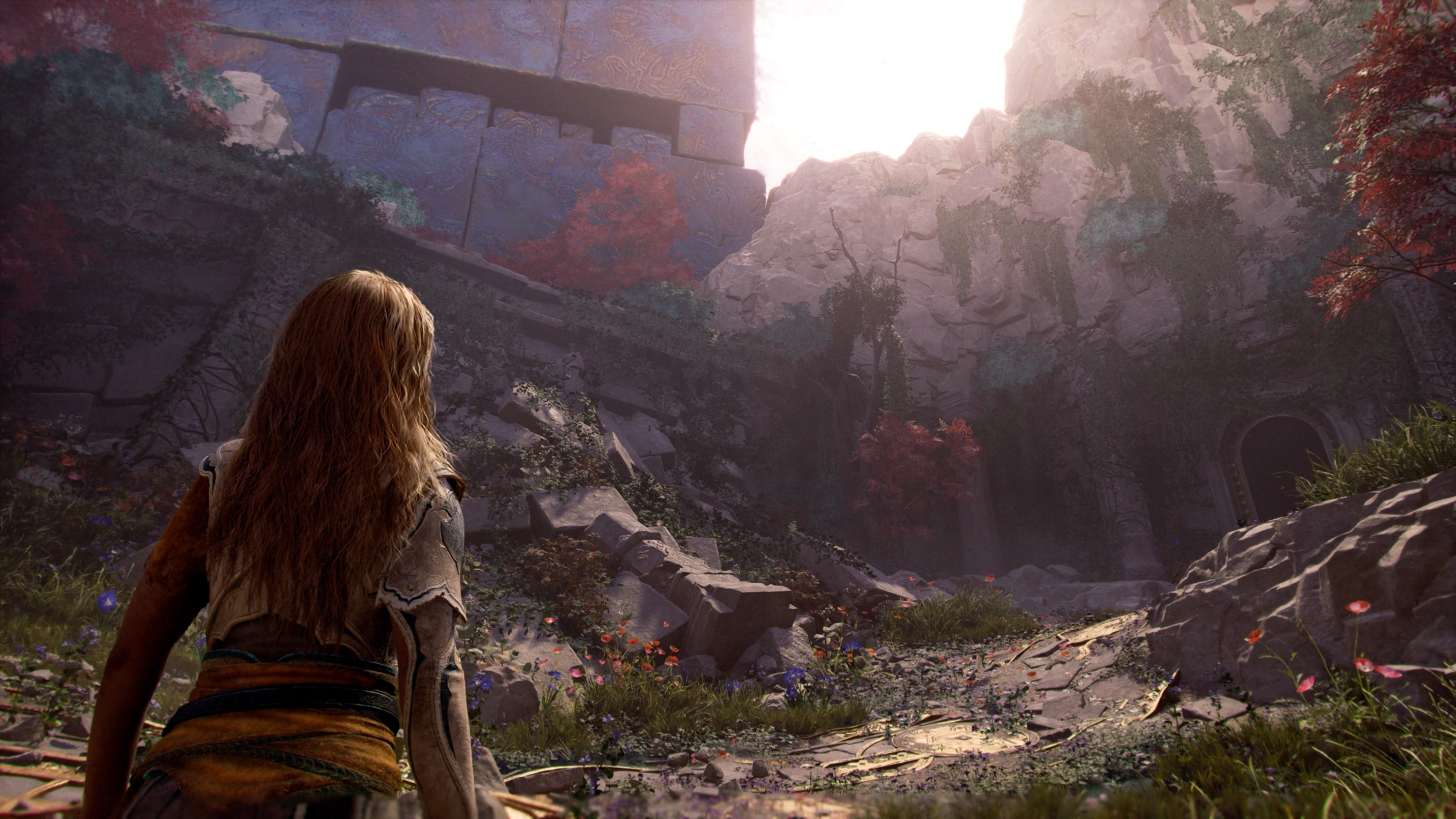 Faye looking out over a sunlit ruined valley in the Everywhen