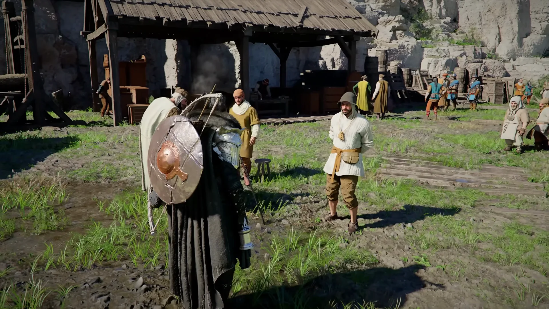 A blacksmith forging weapons at the anvil